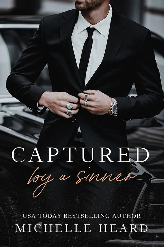 Captured By A Sinner (The Sinners Series) by Michelle Heard